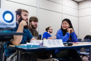 several students sitting in a chinese class